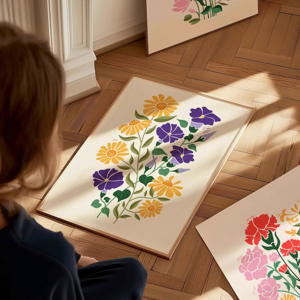 Family Garden prints laid out on a wooden floor